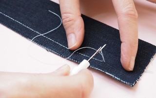 Pulling thread through with unpicker - A quick and neat alternative to backstitching